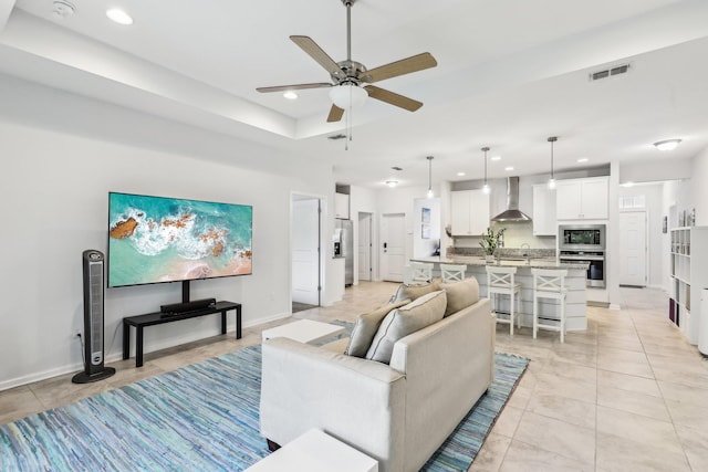 295 Deerfield Meadows Cir, Saint Augustine, FL 32086 - living area featuring recessed lighting, ceiling fan, a raised ceiling, and light tile patterned flooring