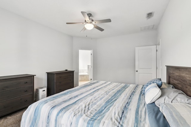 295 Deerfield Meadows Cir, Saint Augustine, FL 32086 - bedroom featuring ensuite bath, a ceiling fan, and dark carpet