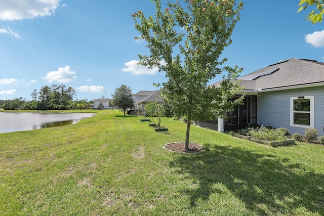 295 Deerfield Meadows Cir, Saint Augustine, FL 32086 - view of grassy yard featuring a water view and a sunroom