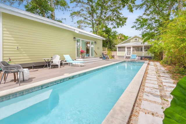 48 Osceola St, Saint Augustine, FL 32084 - pool with a sunroom and a wooden deck