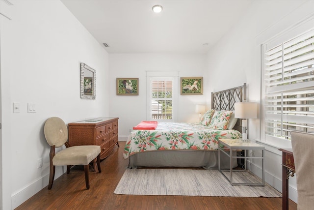 48 Osceola St, Saint Augustine, FL 32084 - bedroom with baseboards, visible vents, and wood finished floors