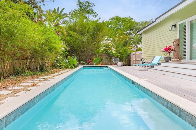 48 Osceola St, Saint Augustine, FL 32084 - view of swimming pool featuring a fenced in pool, a wooden deck, and a fenced backyard