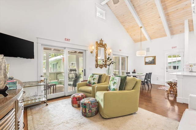 48 Osceola St, Saint Augustine, FL 32084 - living area with baseboards, wood ceiling, high vaulted ceiling, wood finished floors, and beam ceiling