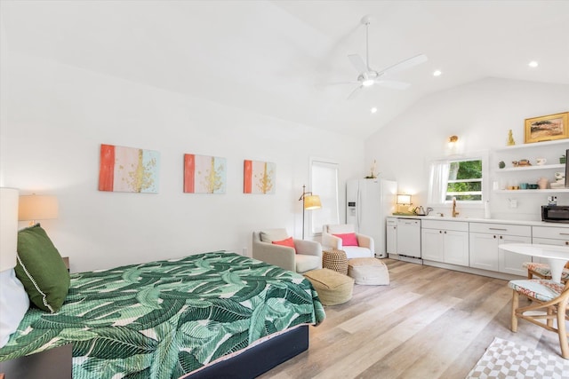 48 Osceola St, Saint Augustine, FL 32084 - bedroom featuring high vaulted ceiling, light wood-type flooring, white fridge with ice dispenser, and recessed lighting