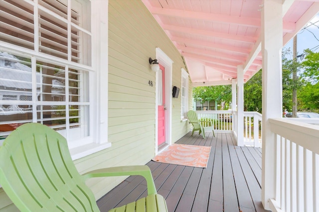 48 Osceola St, Saint Augustine, FL 32084 - wooden deck featuring a porch