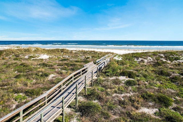 view of water feature with a beach view