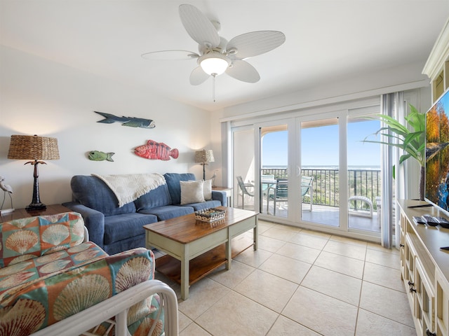 tiled living room featuring ceiling fan