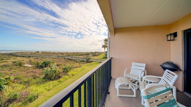 balcony featuring a rural view