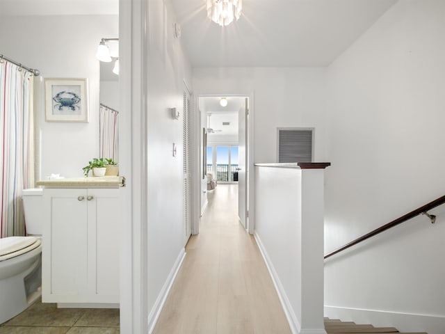 hallway featuring light hardwood / wood-style floors