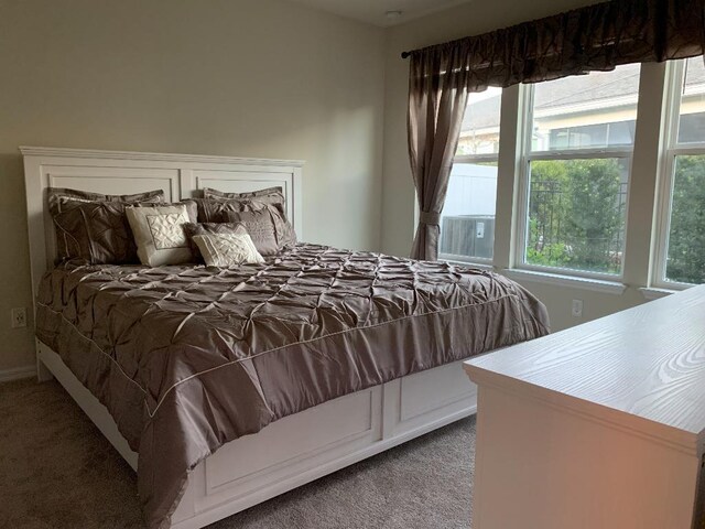 46 Curved Bay Trl, Ponte Vedra, FL 32081 - carpeted bedroom featuring cooling unit and multiple windows