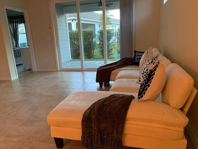46 Curved Bay Trl, Ponte Vedra, FL 32081 - living area with light tile patterned floors, baseboards, and ceiling fan