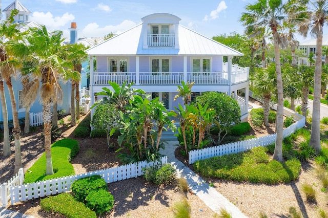 view of front of property with a balcony