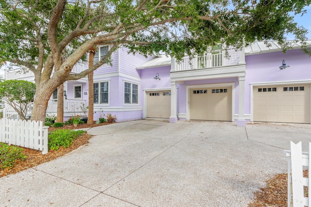 view of front of property with a balcony