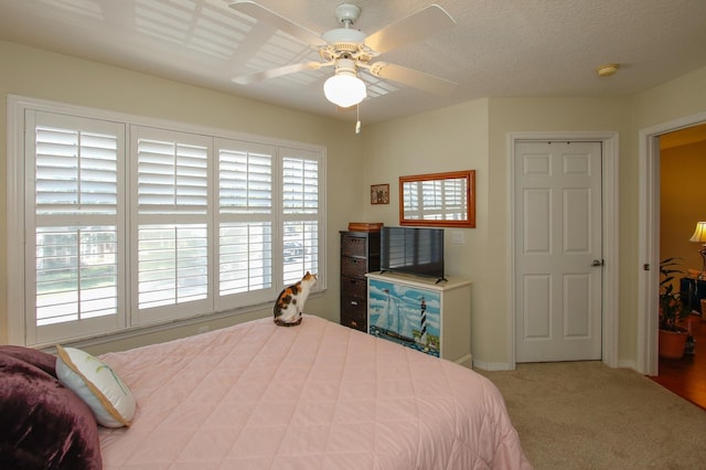 23213 Harbour Vista Cir, Saint Augustine, FL 32080 - carpeted bedroom with ceiling fan and baseboards