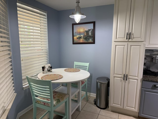 1810 Prestwick Pl, Saint Augustine, FL 32086 - dining room with light tile patterned floors and baseboards
