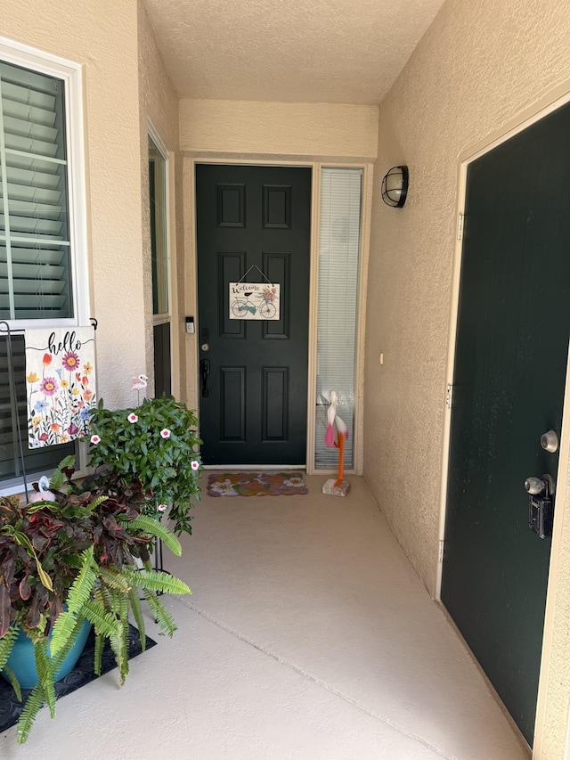1810 Prestwick Pl, Saint Augustine, FL 32086 - view of exterior entry featuring stucco siding