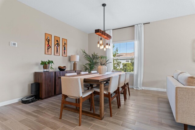 dining room featuring a chandelier