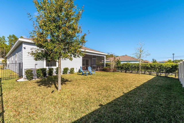 view of yard with a sunroom