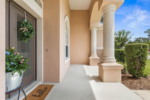 19 Ehrling Ln, Palm Coast, FL 32164 - entrance to property featuring stucco siding