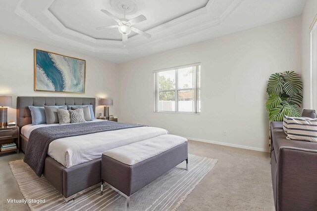 19 Ehrling Ln, Palm Coast, FL 32164 - bedroom featuring light carpet, a tray ceiling, ceiling fan, ornamental molding, and baseboards