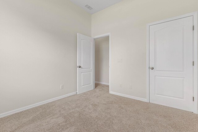 19 Ehrling Ln, Palm Coast, FL 32164 - unfurnished bedroom featuring carpet and baseboards