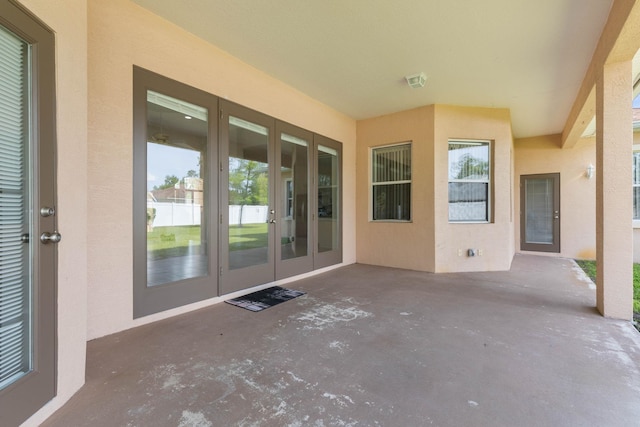 19 Ehrling Ln, Palm Coast, FL 32164 - view of patio featuring french doors