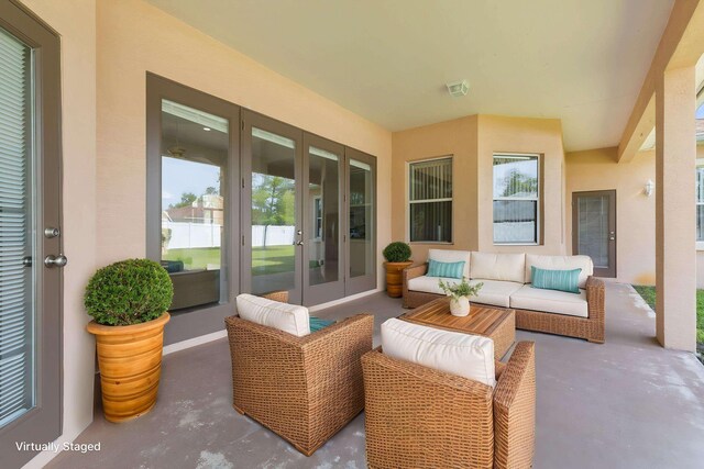 19 Ehrling Ln, Palm Coast, FL 32164 - view of patio / terrace with french doors and outdoor lounge area
