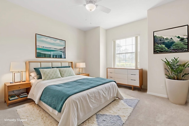 19 Ehrling Ln, Palm Coast, FL 32164 - carpeted bedroom with baseboards and ceiling fan