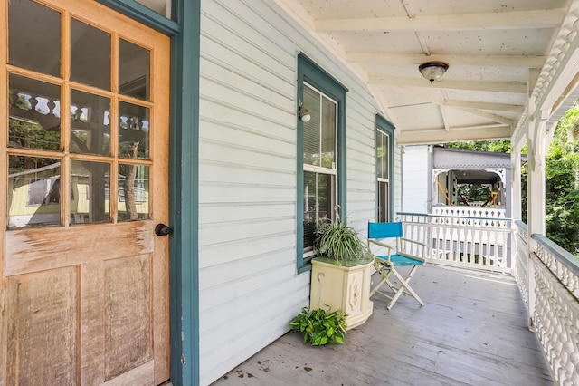 deck featuring covered porch