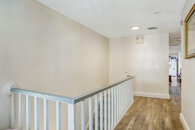 hallway with light wood-type flooring