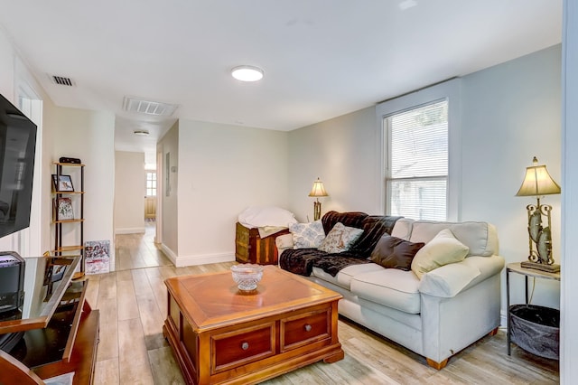 living room featuring light hardwood / wood-style floors