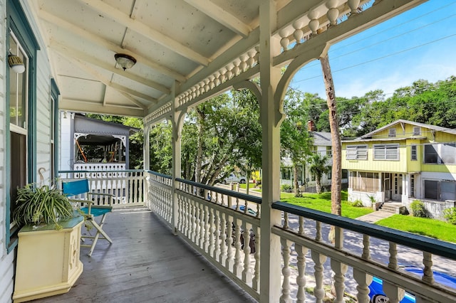 balcony featuring a porch