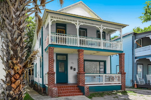 view of front facade with a porch and a balcony