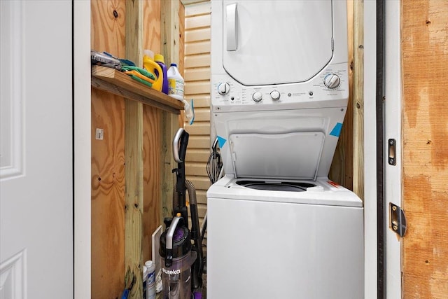 laundry room featuring stacked washer / dryer