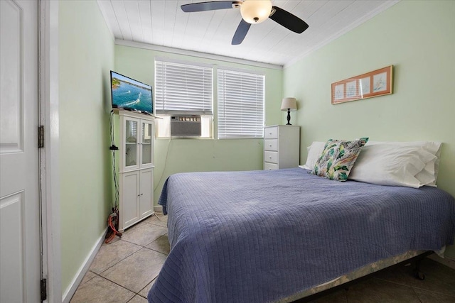 bedroom with light tile patterned floors, cooling unit, ceiling fan, and crown molding