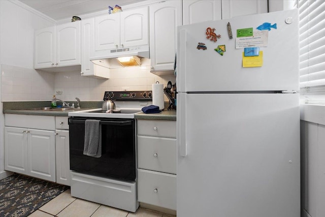 kitchen featuring backsplash, white appliances, crown molding, white cabinets, and light tile patterned flooring