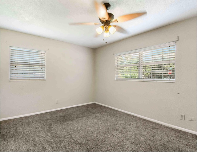 empty room with carpet, a textured ceiling, and ceiling fan