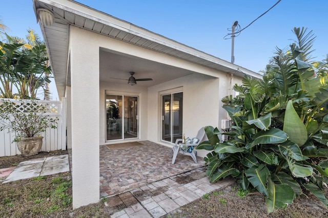 view of patio / terrace featuring ceiling fan