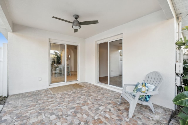 view of patio with ceiling fan