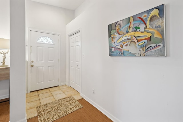 foyer with tile patterned floors