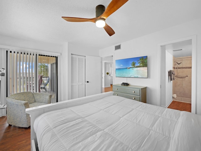 4250 S A1A Unit D33, Saint Augustine, FL 32080 - bedroom featuring a closet, wood finished floors, a ceiling fan, and ensuite bathroom