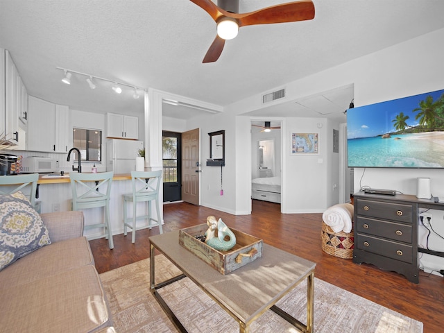 4250 S A1A Unit D33, Saint Augustine, FL 32080 - living area featuring ceiling fan and wood finished floors