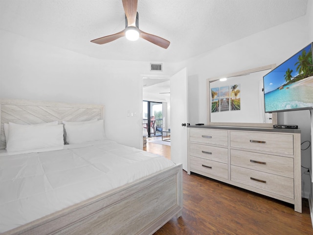 4250 S A1A Unit D33, Saint Augustine, FL 32080 - bedroom with dark wood-style flooring and a ceiling fan