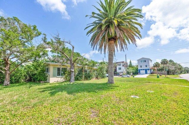 view of yard featuring a garage