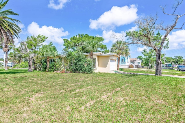 view of yard featuring a garage