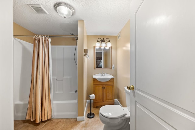 full bathroom with tile patterned flooring, vanity, toilet, shower / bath combo, and a textured ceiling