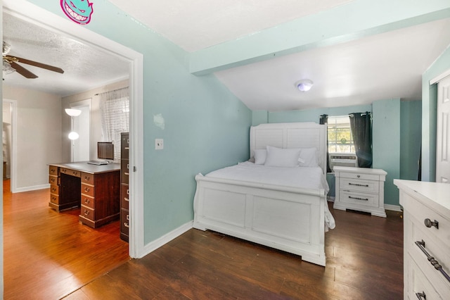 bedroom with dark wood-type flooring