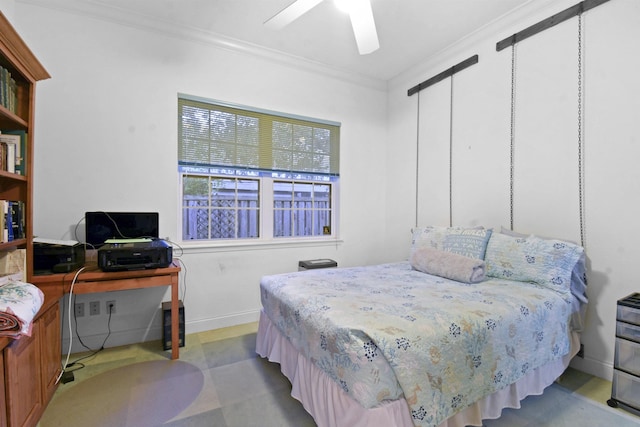 bedroom with ceiling fan, ornamental molding, and light carpet