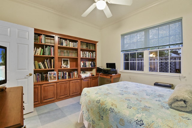 bedroom featuring ceiling fan and ornamental molding