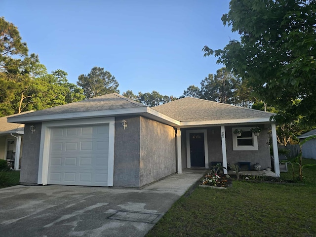 single story home with a garage, driveway, a porch, a front yard, and stucco siding